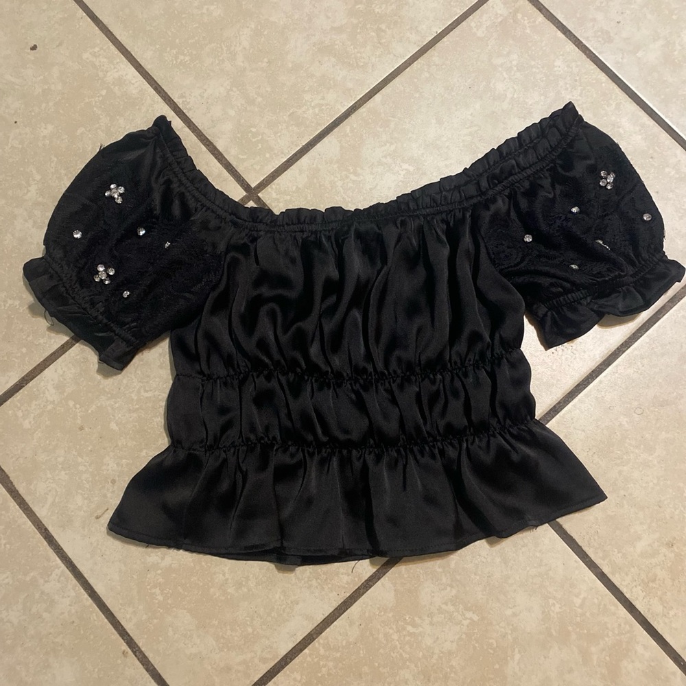 Elegant Black Off-Shoulder Top with Floral Details